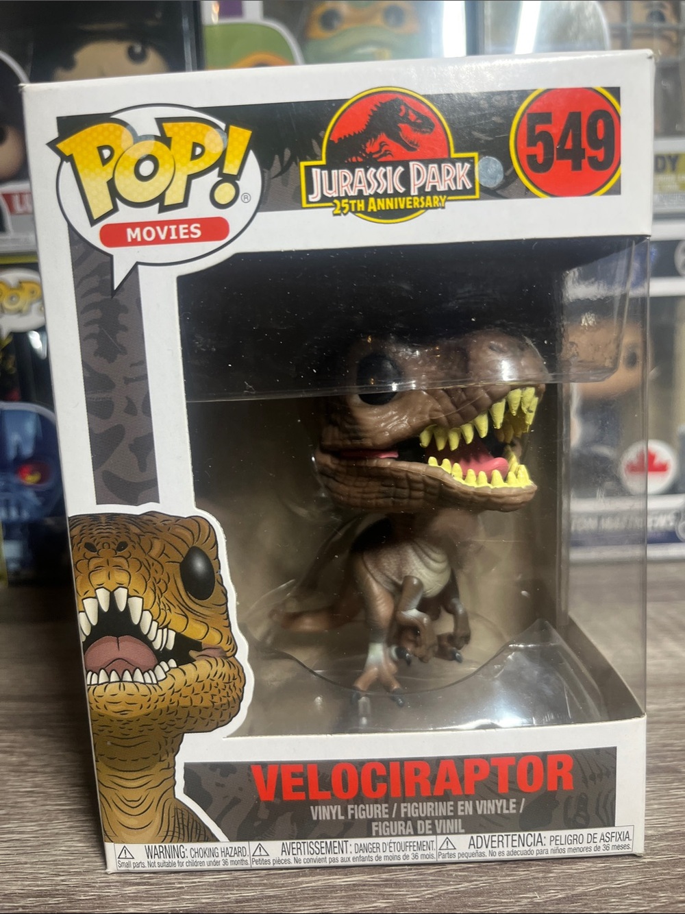 Funko Pop! Jurassic Park Velociraptor - Brown, Yellow, Black